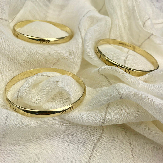 Gold-Tone Carved Bombshell Bangle